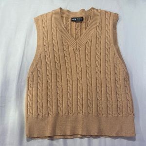 brown sweater vest